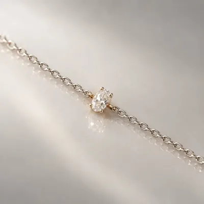 14K 오벌 큐빅 팔찌 1.28g — 알 하나짜리 팔찌에서 진짜 중요한 건 발이다